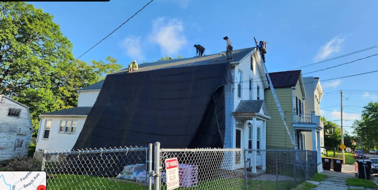 Roof replacement in progress, shared with Saqib's review